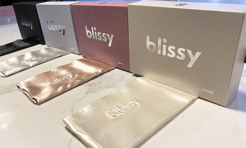 Blissy displayed with boxes in different colors